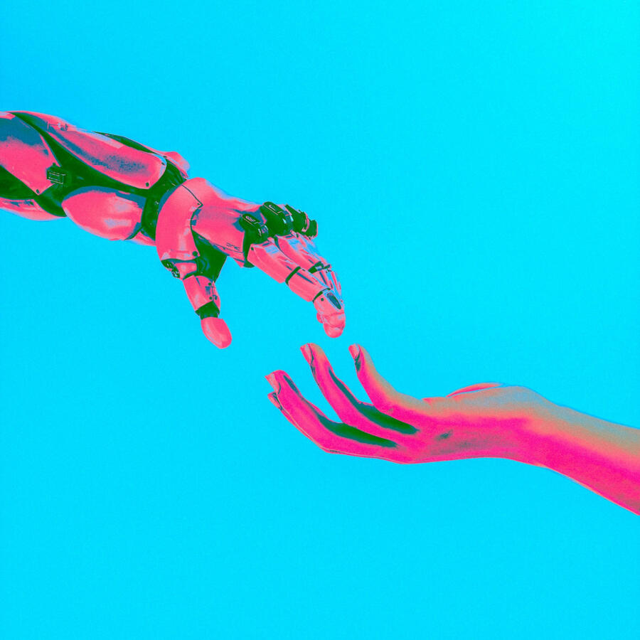 A robot hand stretches out toward a human hand